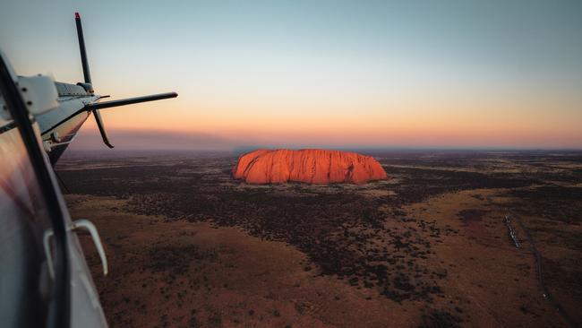 Three Uluru flights linked to interstate coronavirus cases have been added to NSW and Queensland Health’s contact tracing lists.