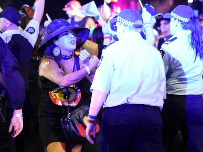 25 FEBRUARY 2023 SYDNEY AU, WWW.MATRIXPICTURES.COM.AU, NON EXCLUSIVE PICTURES, WORLD PRIDE 2023: SYDNEY GAY AND LESBIAN MARDI GRAS PARADE 2023, PICTURED: LIDIA THORPE CONFRONTS FEDERAL POLICE YELLING FUCK THE POLICE, NOTE: The caption above is the photographerÃ¢â‚¬â„¢s impression only and may or may not be factual. It is the responsibility of the end user, publisher or licensee to verify the data before publication. All editorial images subject to the following: For editorial use only. Additional clearance required for commercial, wireless, internet or promotional use.Images may not be altered or modified. Matrix Media Group makes no representations or warranties regarding names, trademarks or logos appearing in the images., DISCLAIMER: To the maximum extent permitted by law, we make no representations or warranties about our Content, including (without limitation) that:, They are complete, accurate, reliable, up-to-date and suitable for any particular purpose.