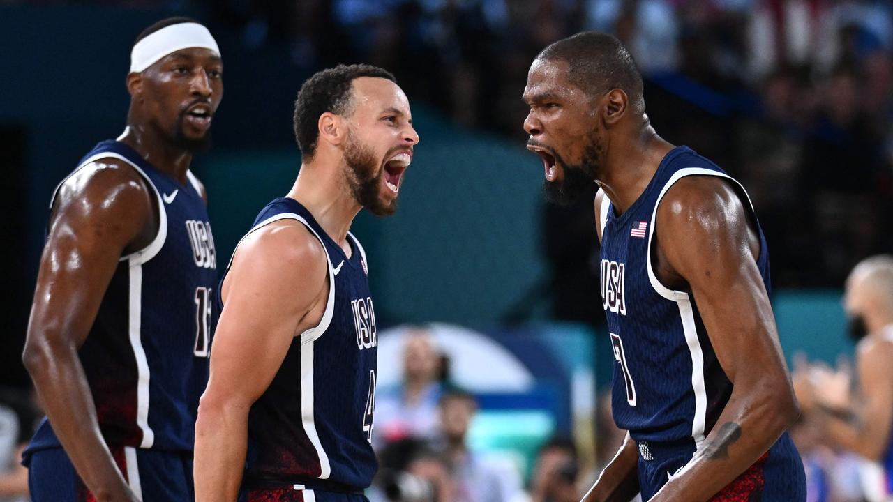 Steph Curry and Kevin Durant celebrate on their way to gold. Picture: AFP