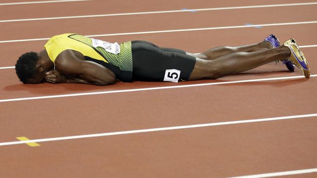 Usain Bolt is distraught after collapsing with injury in his final race.