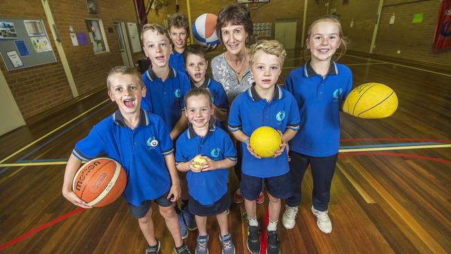 Gisborne Primary School principal Julie Soutter and students in the gym which will be replaced thanks to State Budget funding. Picture: Rob Leeson