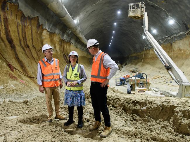 Transport for NSW secretary Rodd Staples, Premier Gladys Berejiklian and Transport Minister Andrew Constance beneath Barangaroo. Picture: James Brickwood