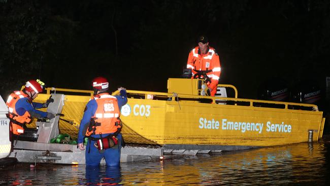 Emergency crews at Lansvale where 300 people were evacuated. Pics Bill Hearne