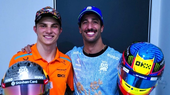 Daniel Ricciardo and Oscar piastri swap helmets. Photo: Instagram, @danielricciardo.