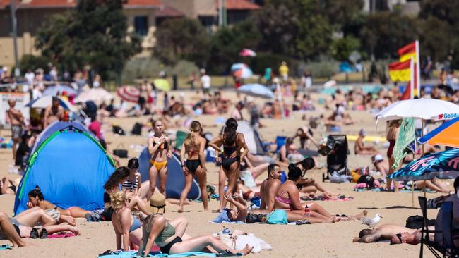 A packed Melbourne beach on Saturday as temperatures reached 30C. Picture: NCA NewsWire/Ian Currie