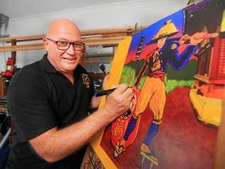 Murwillumbah artist David Lovegrove with some of his vibrant work. Picture: Scott Powick