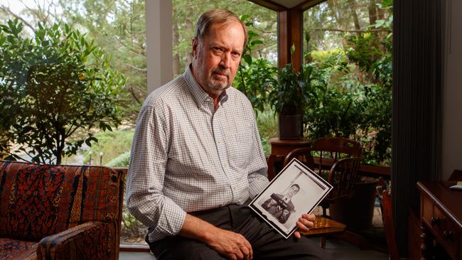 Andrew Knox holding his selection board photograph from September 1966. Picture: Matt Turner