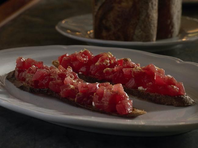 Hot new snack alert. Tuna tartare and sobrasada (spreadable Spanish sausage) on a crunchy toasted baguette.