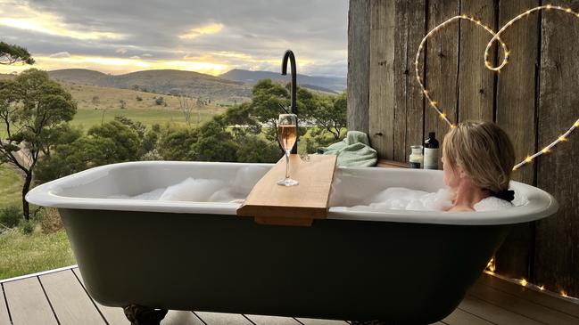 Aquila Glamping at Richmond. An outdoor bath with a view, on the deck of the property's luxury, off-grid glamping tent. Picture: Supplied.