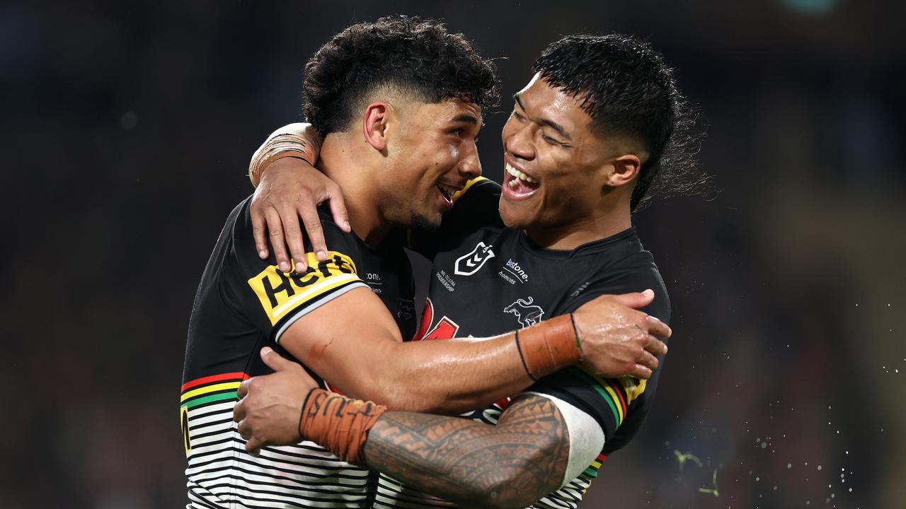 SYDNEY, AUSTRALIA - SEPTEMBER 24: Izack Tago of the Panthers celebrates with team mate Brian To'o after scoring a try during the NRL Preliminary Final match between the Penrith Panthers and the South Sydney Rabbitohs at Accor Stadium on September 24, 2022 in Sydney, Australia. (Photo by Mark Metcalfe/Getty Images)