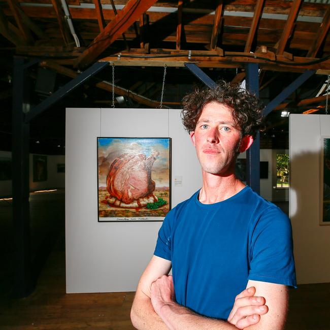 Hobart artist Robert O'Connor won the Glover Prize with his painting of a lamb dinner in a southern Tasmanian agricultural landscape. Picture: PATRICK GEE