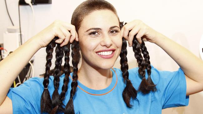 Henrietta Moore says her hair is so thick she managed to get 7 braids of hair that will be used to help make wigs for those in need. Picture: Tertius Pickard