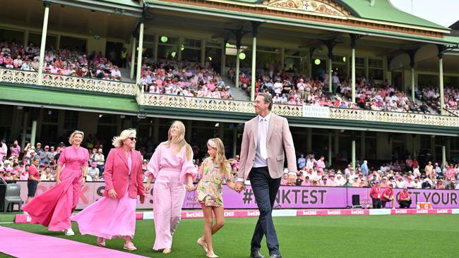 Cricketer Glenn McGrath arrives with his family members to pick up pink caps from the players on Jane McGrath Day in January. McGrath has been appointed an Officer of the Order of Australia. Picture: Saeed Khan/AFP