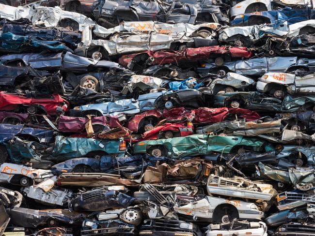 GCB PICTURE - Crushed cars stacked up for recycling