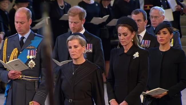 Prince William, Prince Harry, Kate Middleton and Meghan Markle stood together at the service at Westminster Hall. Picture: BBC.