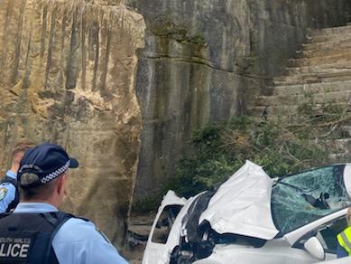 SYDNEY, AUSTRALIA - NCA NewsWire Photos - 04 MARCH, 2024: A man has been taken to hospital after his car plunged off an inner city cliff. The 70-year-old man's white Hyundai hatchback went off an embankment at the end of Darghan Street at Glebe, in Sydney's inner west, about 10am on Monday. Picture: NCA NewsWire handout