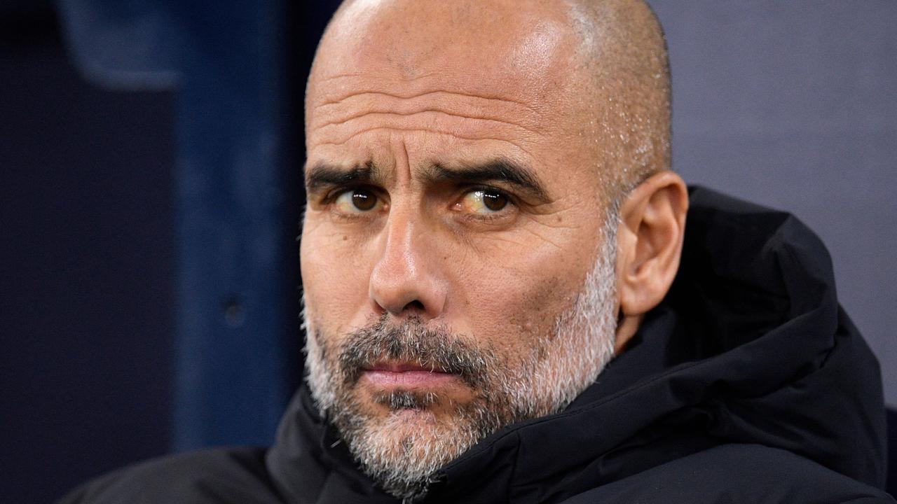 Manchester City's Spanish manager Pep Guardiola attends the English FA Cup fourth round football match between Manchester City and Arsenal at the Etihad Stadium in Manchester, northwest England, on January 27, 2023. (Photo by Oli SCARFF / AFP) / RESTRICTED TO EDITORIAL USE. No use with unauthorized audio, video, data, fixture lists, club/league logos or 'live' services. Online in-match use limited to 120 images. An additional 40 images may be used in extra time. No video emulation. Social media in-match use limited to 120 images. An additional 40 images may be used in extra time. No use in betting publications, games or single club/league/player publications. /