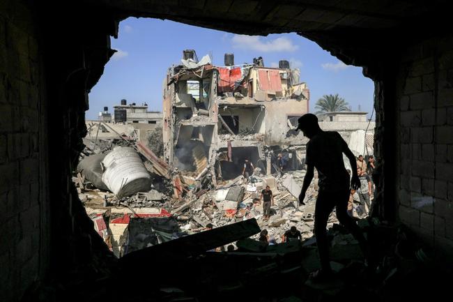 Buildings destroyed during Israeli bombardment in Khan Yunis, southern Gaza, on November 8, 2023