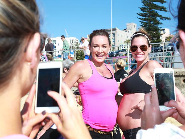 Michelle Bridges at Bondi Beach with mum-to-be Bree Fennell during the Guinness World Record Largest Fit Ball Class. Picture: Dylan Robinson