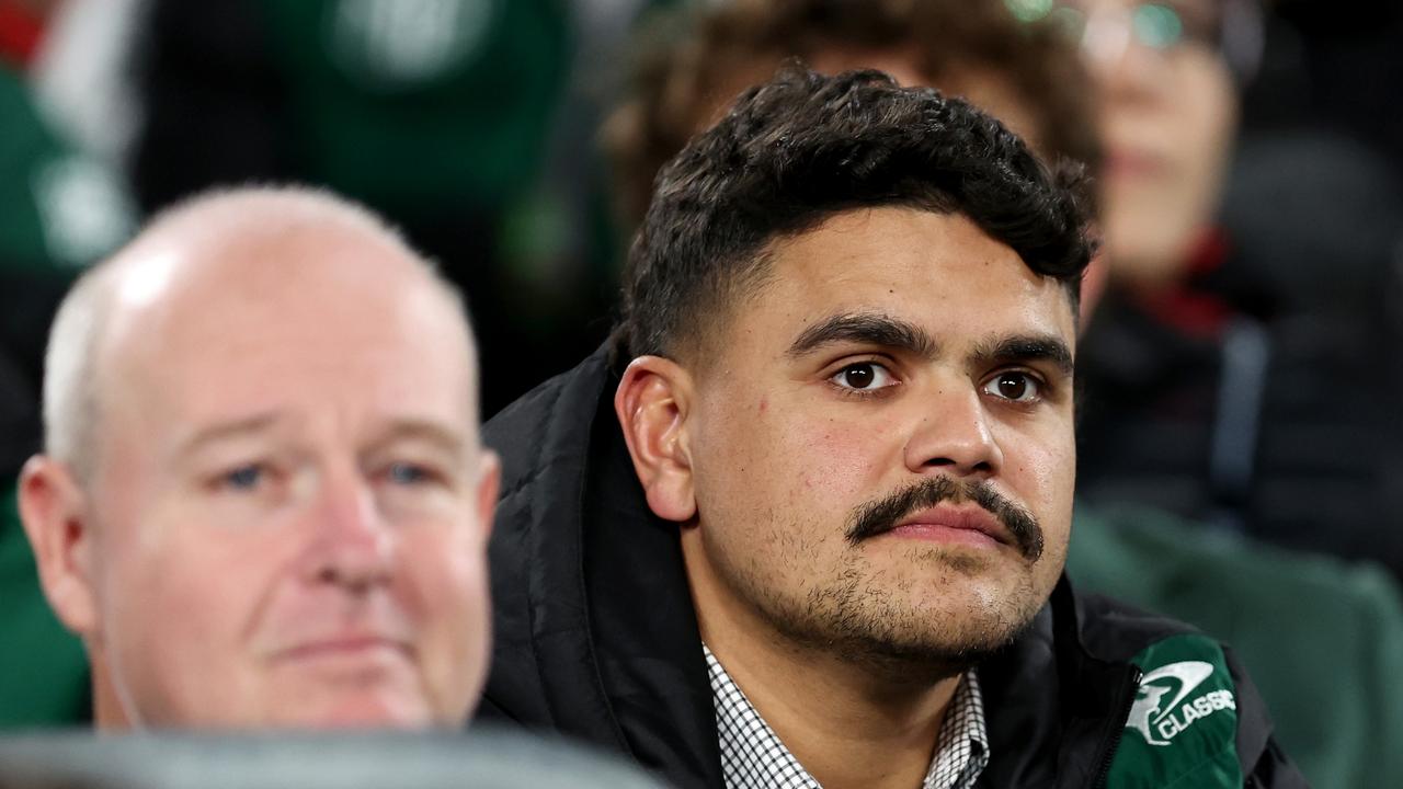 SYDNEY, AUSTRALIA - AUGUST 08: Latrell Mitchell of the Rabbitohs looks on from the stands during the round 23 NRL match between South Sydney Rabbitohs and Melbourne Storm at Accor Stadium, on August 08, 2024, in Sydney, Australia. (Photo by Brendon Thorne/Getty Images)