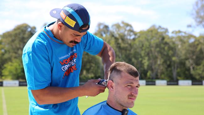 Gold Coast Titans star Young Tonumaipea shaved Arrow’s luscious locks for the Leukaemia Foundation’s World’s Greatest Shave. Photo: Supplied.