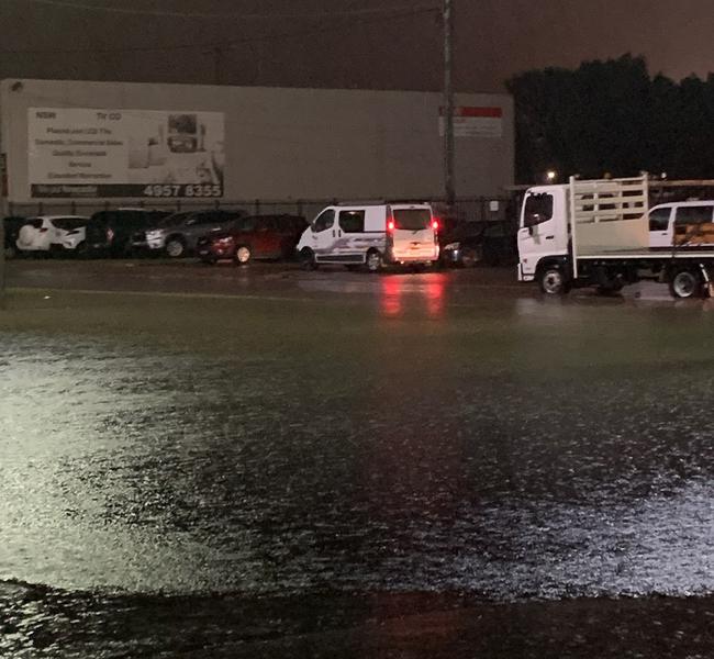 Flood waters surround the car park at McDonald Jones Stadium.