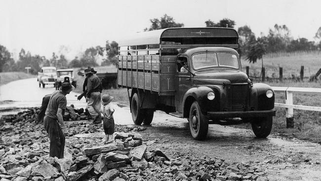 1950s: Repairs to Gympie Rd, Lawnton, after being washed away. Photo: courtesy Moreton Bay Regional Council.