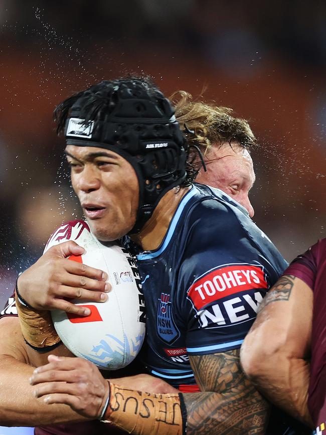 To'o gives away 12 cm to Maroons rival Xavier Coates and could struggle to contain the aerial threat. Picture: Getty Images.