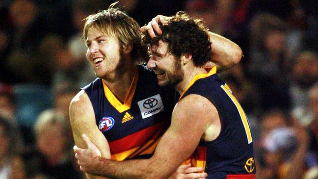 Footballer Trent Hentschel with Ken McGregor. AFL Football – Adelaide Crows vs Essendon match at AAMI Stadium 03 Jun 2006. a/ct /Football/AFL