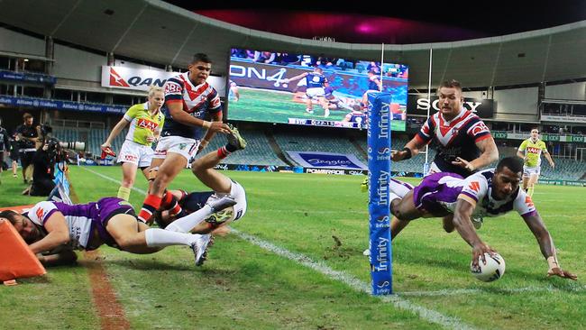 SuperCoach standout Suliasi Vunivalu scores his second try against the Roosters. Picture: Mark Evans
