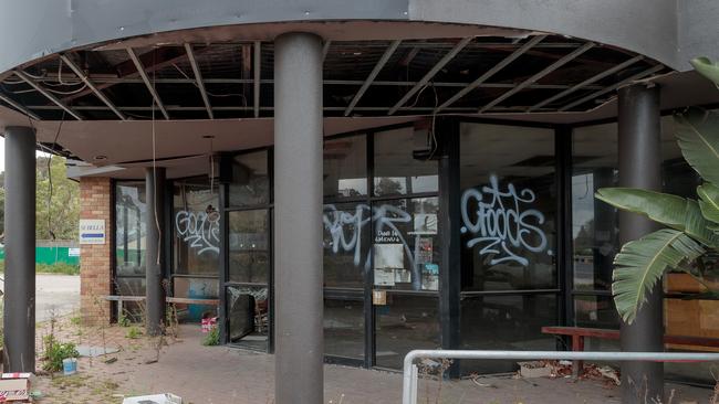 Original Joes in Heathmont is looking like a bomb site, 15 months after it burnt down. There's broken windows, no safety fencing and heaps of rubbish on site. It is pictured on Tuesday 25th September, 2018.