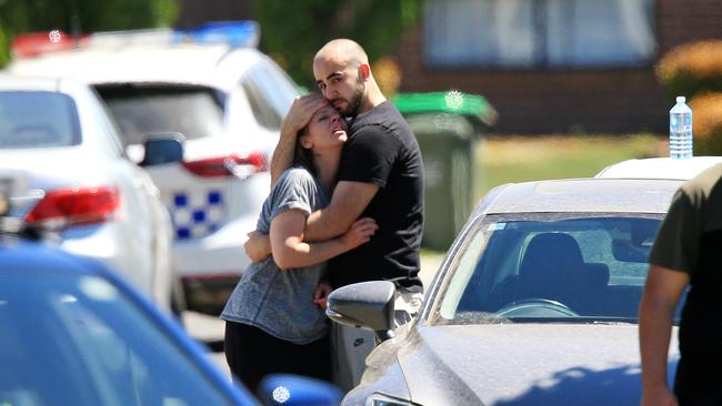 Loved ones console each other after the death of Celeste Manno in Mernda. Picture: Mark Stewart