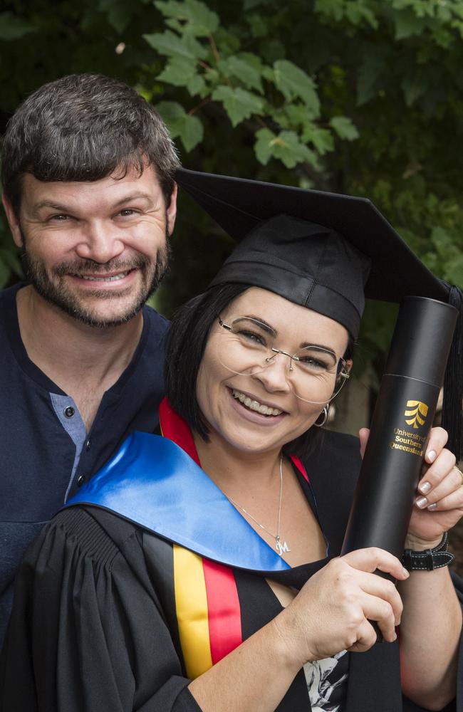 Bachelor of Nursing graduate Mel Self celebrates with husband Andrew Self at a UniSQ graduation ceremony at Empire Theatres, Tuesday, February 13, 2024. Picture: Kevin Farmer