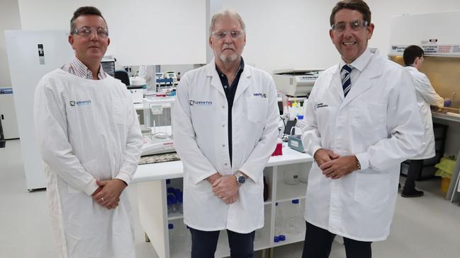 Dr Wayne Finlayson (centre) with Nicklin MP Robert Skelton, left, and treasurer Cameron Dick at Servatus.