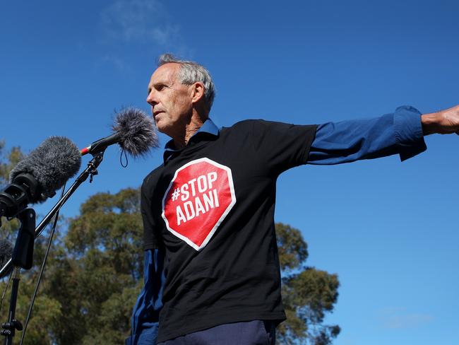 Activist and former Greens leader Bob Brown addresses the anti-Adani convoy outside Parliament House in Canberra.