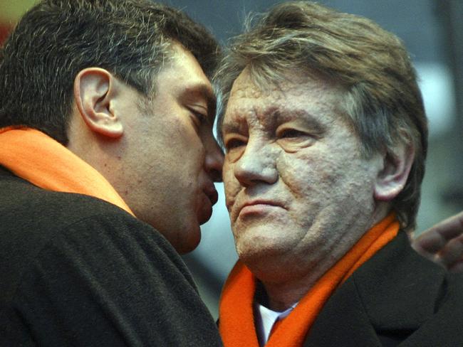 Mr Nemtsov (left) with former Ukrainian president Viktor Yushchenko (who survived an attempt on his life by an unknown assassin who laced his soup with dioxin, hence his bizarre complexion) in 2004.