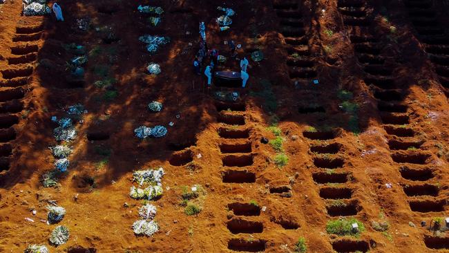 A burial with coronavirus protocols under at the Vila Formosa cemetery in Sao Paulo, Brazil, on Sunday. Picture: AFP