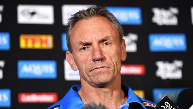 Gold Coast coach Neil Henry speaks to the media on Tuesday at Titans headquarters. Picture: AAP