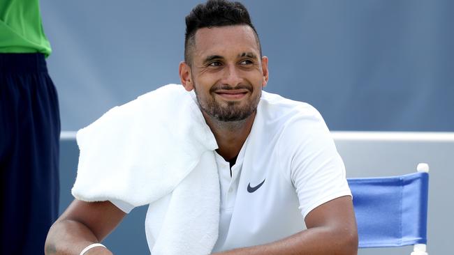 Nick Kyrgios forgets shoes, wins.
