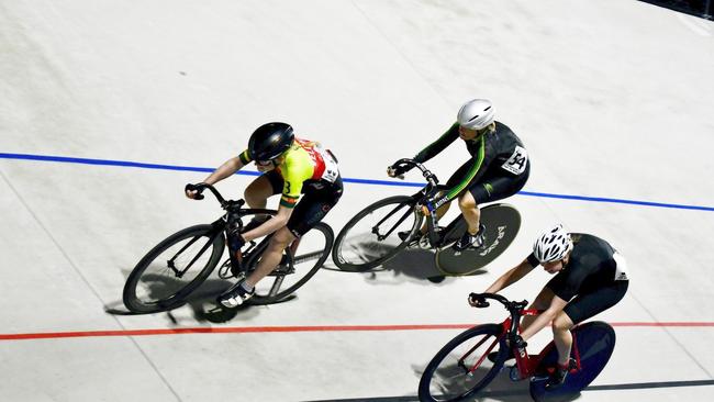 At the 2022 Townsville Cup on Wheels, Cairns Cycling Club rider Gabby Thomasz (top right silver helmet) was second when she raced against Caitlan Corset (left) who won and her sister Stephanie Corset (lower right) placed third in the Women's A Grade Keirin at Townsville Velodrome.