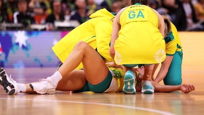 SYDNEY, AUSTRALIA - OCTOBER 30: Maddy Proud of Australia is receives attention from the trainers during game two of the International Test series between the Australia Diamonds and the England Roses at Qudos Bank Arena on October 30, 2022 in Sydney, Australia. (Photo by Mark Kolbe/Getty Images for Netball Australia)