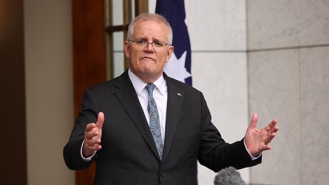 Scott Morrison said Australia has “no choice but to ride the Omicron” as he announced millions more people would get free rapid tests. Picture: Gary Ramage