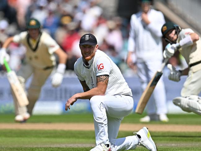 England's captain Ben Stokes (C) won the toss and bowled in Manchester.