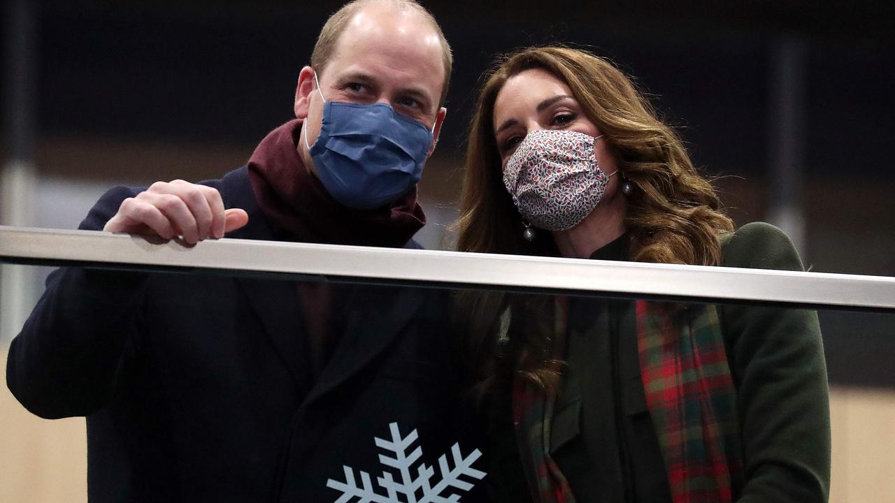 Prince William, Duke of Cambridge and Catherine, Duchess of Cambridge look on from the balcony at London Euston Station. Picture: Chris Jackson / POOL / AFP.