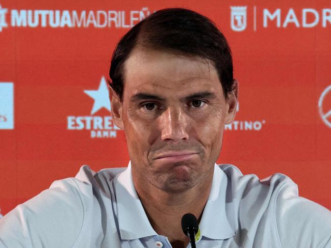 TOPSHOT - Spain's Rafael Nadal answers to journalists during a press conference ahead of the 2024 ATP Tour Madrid Open tennis tournament at Caja Magica in Madrid on April 24, 2024. Rafael Nadal said today he will only play at the upcoming French Open if he feels "capable enough to compete well". The 14-time Roland Garros champion conceded that if the action in Paris were to kick off today, he would not be able to participate but vowed to keep fighting for the chance to play at his most successful tournament one last time. (Photo by Thomas COEX / AFP)