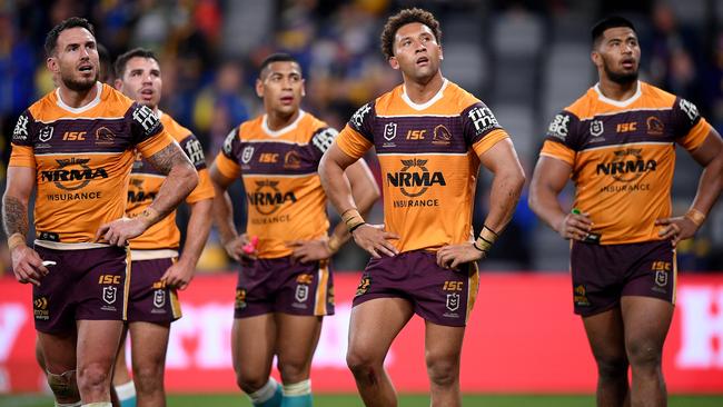 Broncos players look on after conceding a try to the Eels. Picture: AAP