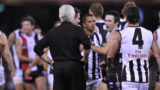 Stephen Milne and Mick Malthouse clash during their infamous clash.