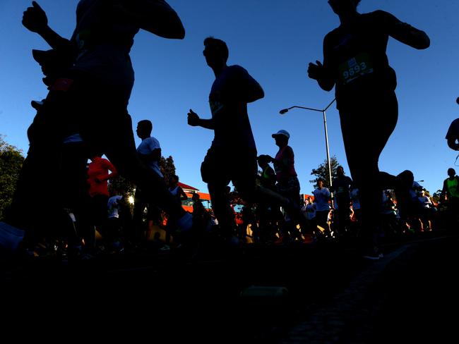 <p>Runners on Hale Street at the start of the Bridge to Brisbane. Picture: Darren England.</p>