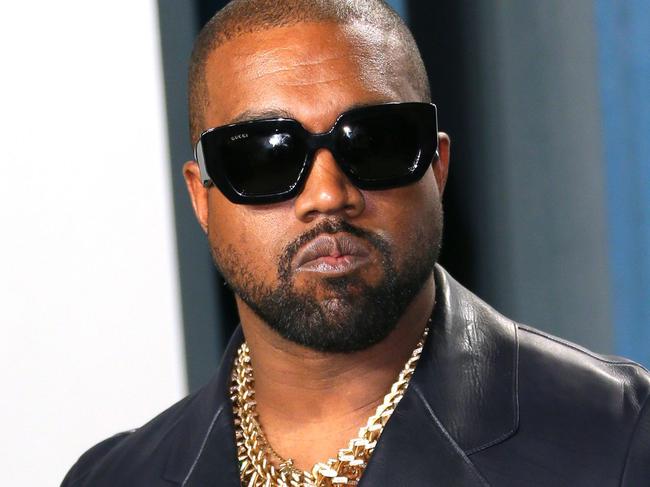 (FILES) In this file photo taken on February 9, 2020 Kanye West attends the 2020 Vanity Fair Oscar Party following the 92nd annual Oscars at The Wallis Annenberg Center for the Performing Arts in Beverly Hills. - US rapper and apparent presidential candidate Kanye West has in the past opened up about his struggles with bipolar disorder. But his recent erratic behavior has again called into question his health and treatment. He launched his election campaign on July 19, 2020 with a rambling speech that saw him rant incoherently, reveal he had wanted to abort his daughter, and break down in tears. (Photo by Jean-Baptiste Lacroix / AFP)