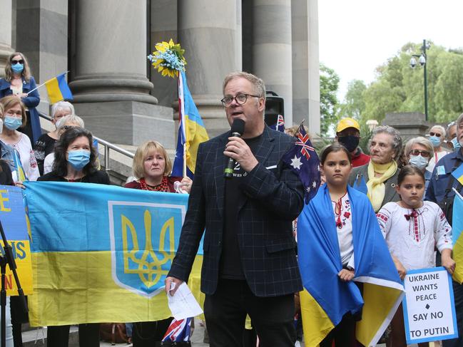 Ukrainian Resident and Business person David Pointon speaks to Ukrainian supporters at The Association of Ukrainians in South Australia rally outside Parliament House, SA. Picture Emma Brasier